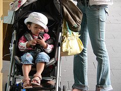 Toddler with mobile phone